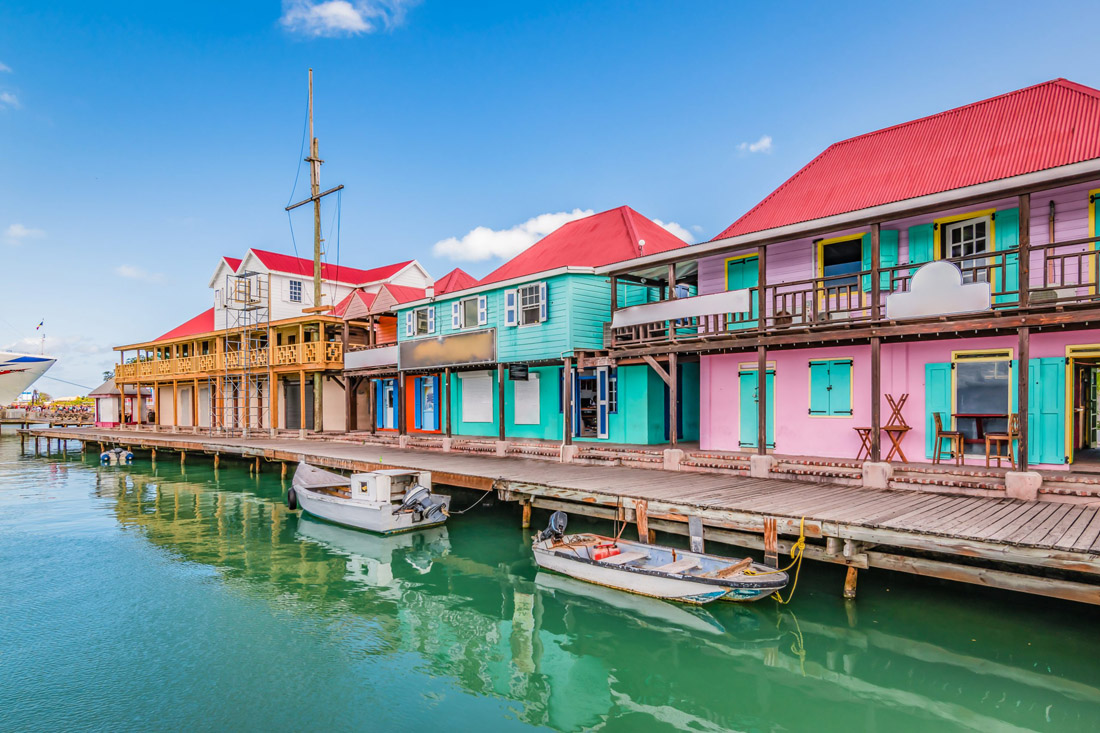 Vibrant buildings adorn the cruise port of St. John's, Antigua, creating a colorful sight.
