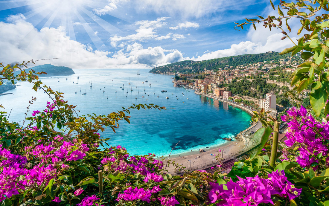 Topic is Travel Destination to France. Aerial view of French Riviera coast with Medieval Town Villefranche.