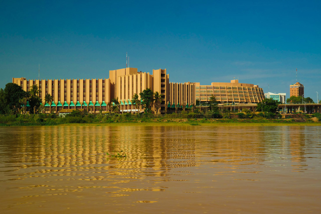 Topic is Travel Destination to Niger. View of the Niger River and Niamey City in Niger.