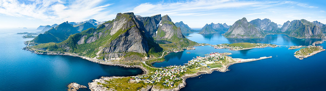 Topic is Travel Destination to Norway. Aerial panoramic view of Reine, a traditional fishing village in Norway.