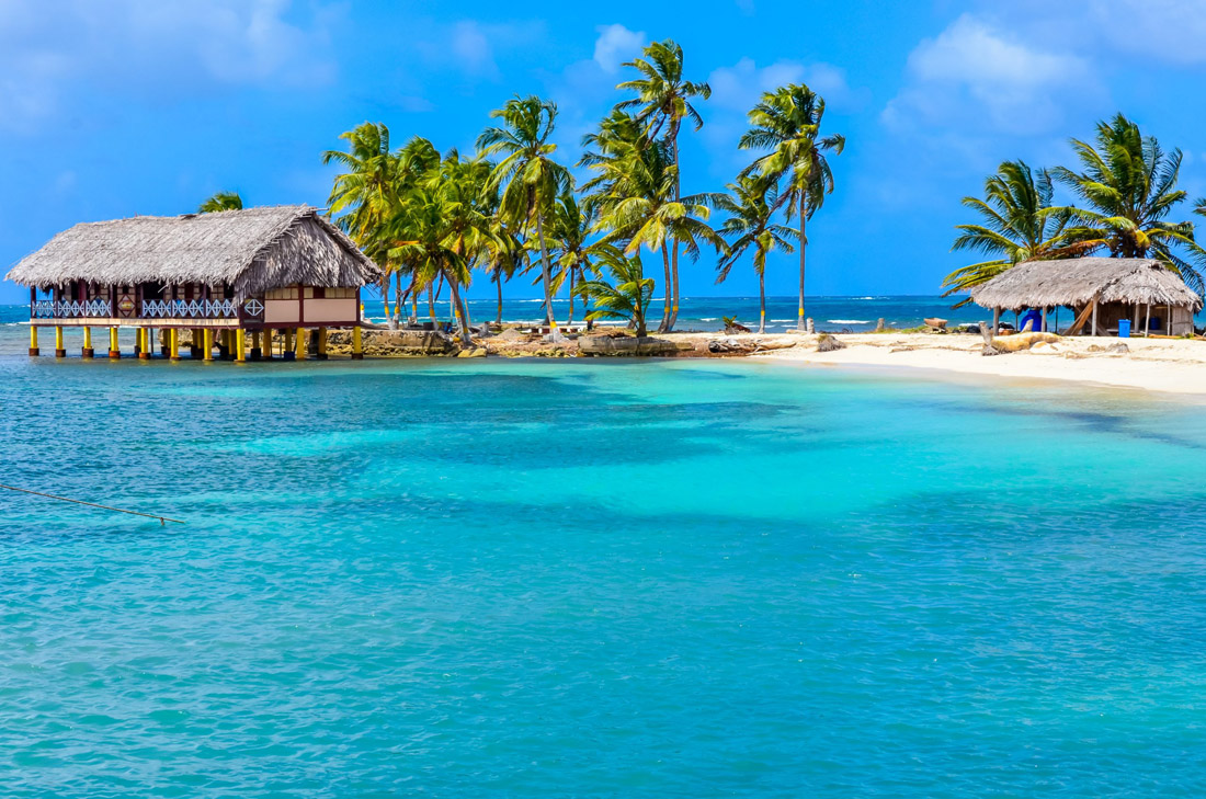 Topic is Travel Destination to Panama. Photograph of a beautiful, lonely beach in Caribbean San Blas Island Kuna Yala.