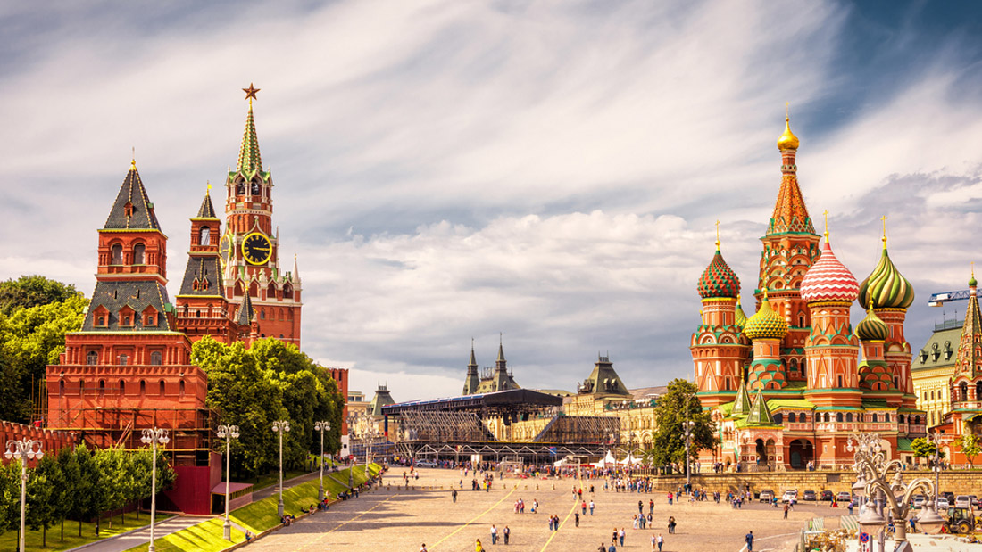 Topic is Travel Destination to Russia. Travel forums to discuss gorgeous destination travel locations such as Moscow Kremlin and of St Basil's Cathedral on Red Square, Moscow, Russia. Ancient Moscow Kremlin is the main tourist attraction of city. Beautiful panoramic view of the heart of Moscow on sunny day.