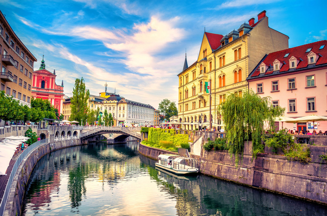 Topic is Travel Destination to Slovenia. Cityscape view on Ljubljanica River Canal in Liubliana, Old Town, Slovenia