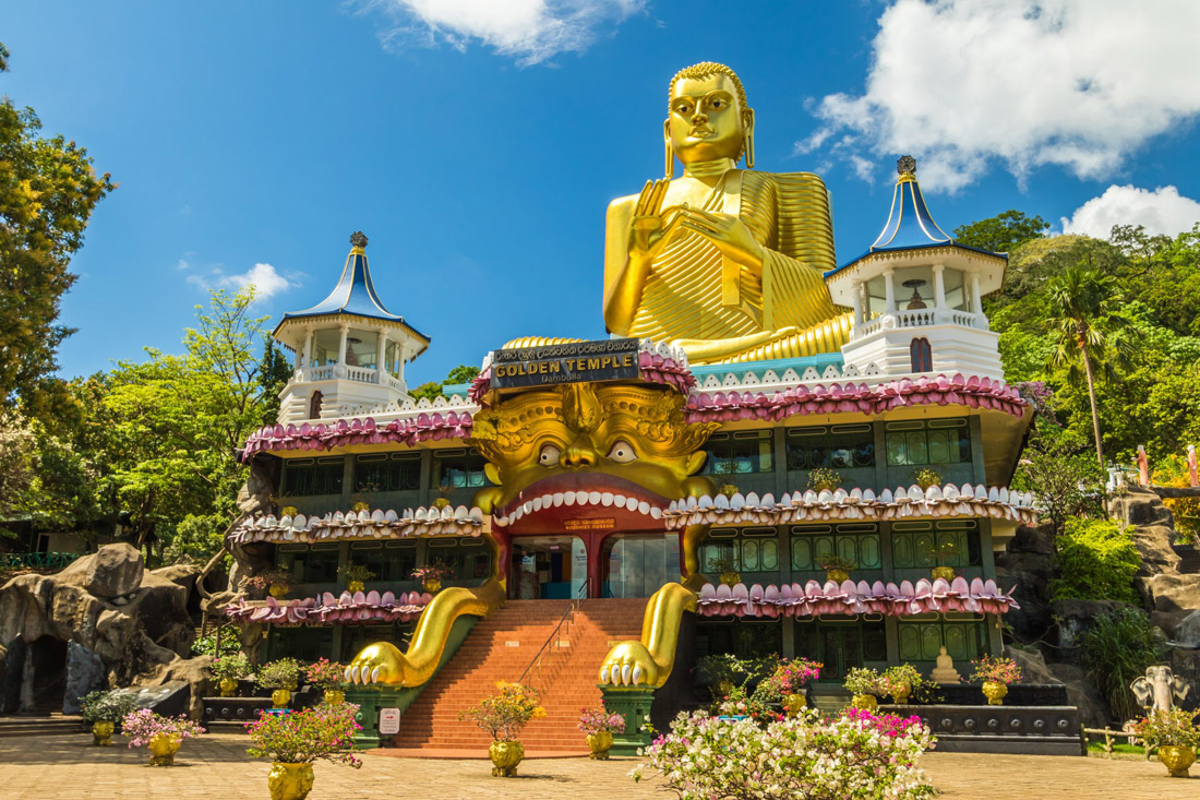 Topic is Travel Destination to Sri Lanka. A scenic tourist attraction, the golden temple in Dambulla, Sri Lanka.