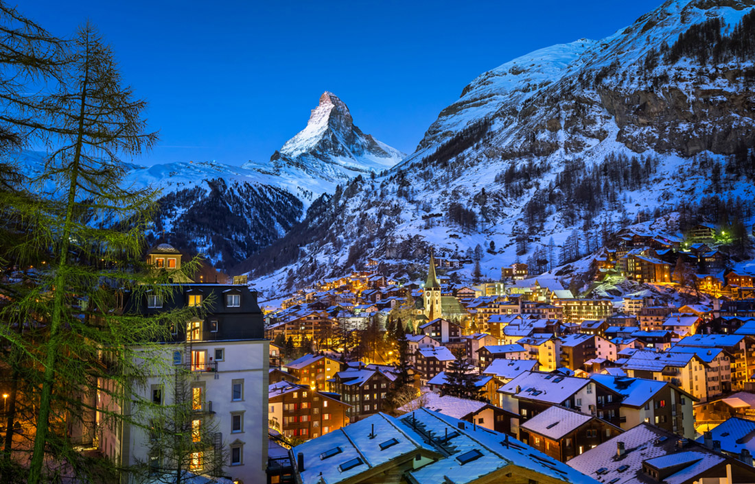 Topic is Travel Destination to Switzerland. Aerial view on Zermatt Valley and Matterhorn Peak at Dawn.