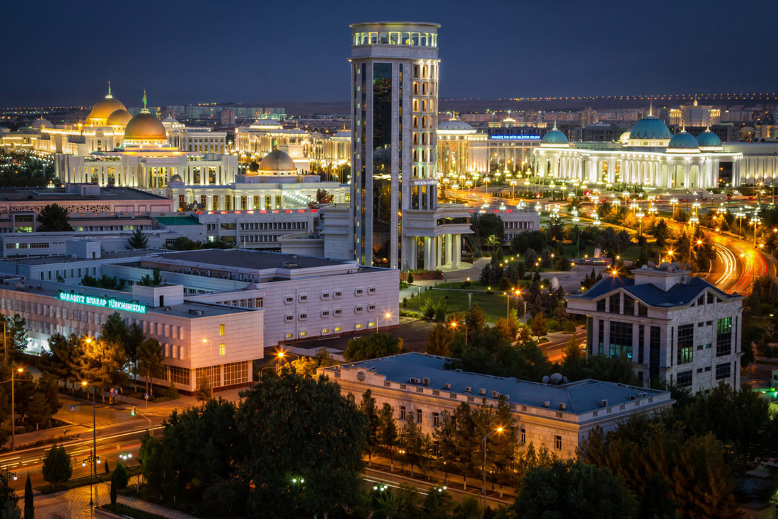 Topic is Travel Destination to Turkmenistan. Scenic photograph of the City of Ashgabat after sunset.