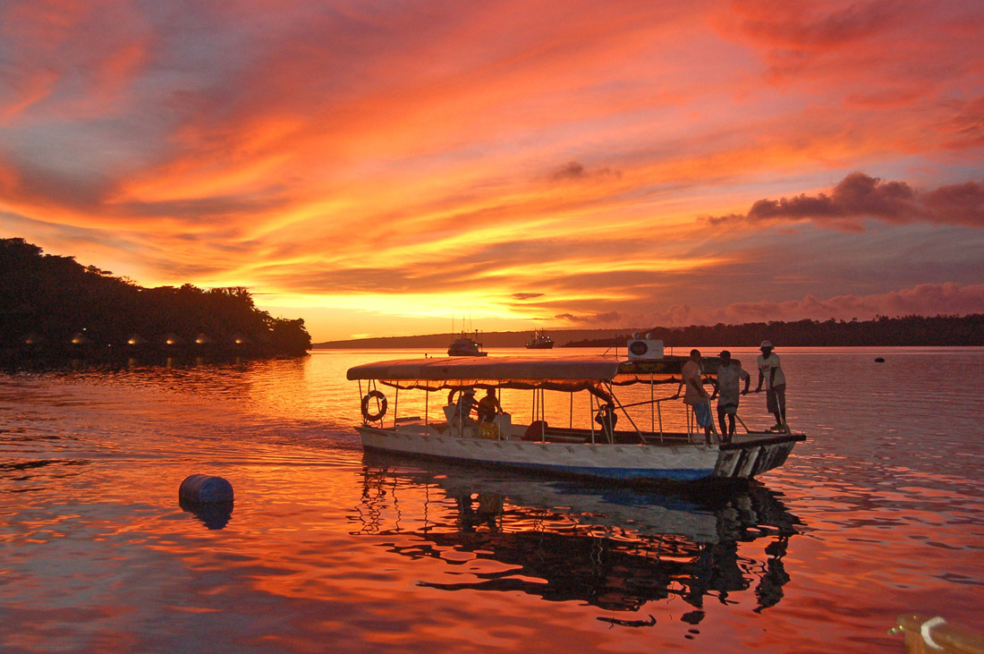 Topic is Travel Destination to Vanuatu. Iririki Island Ferry at sunset, Port Vila Harbour, Vanuatu.