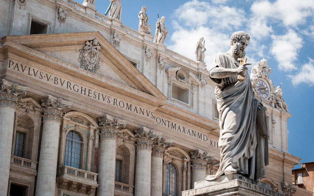Topic is Travel Destination to Vatican City. Low angle view of the Statue of St. Peter at the Vatican.