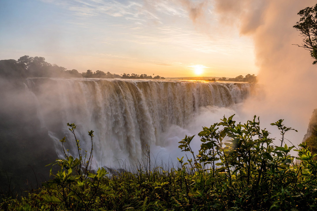 Topic is Travel Destination to Zimbabwe. Beautiful Victoria Falls on the border of Zimbabwe and Zambia.