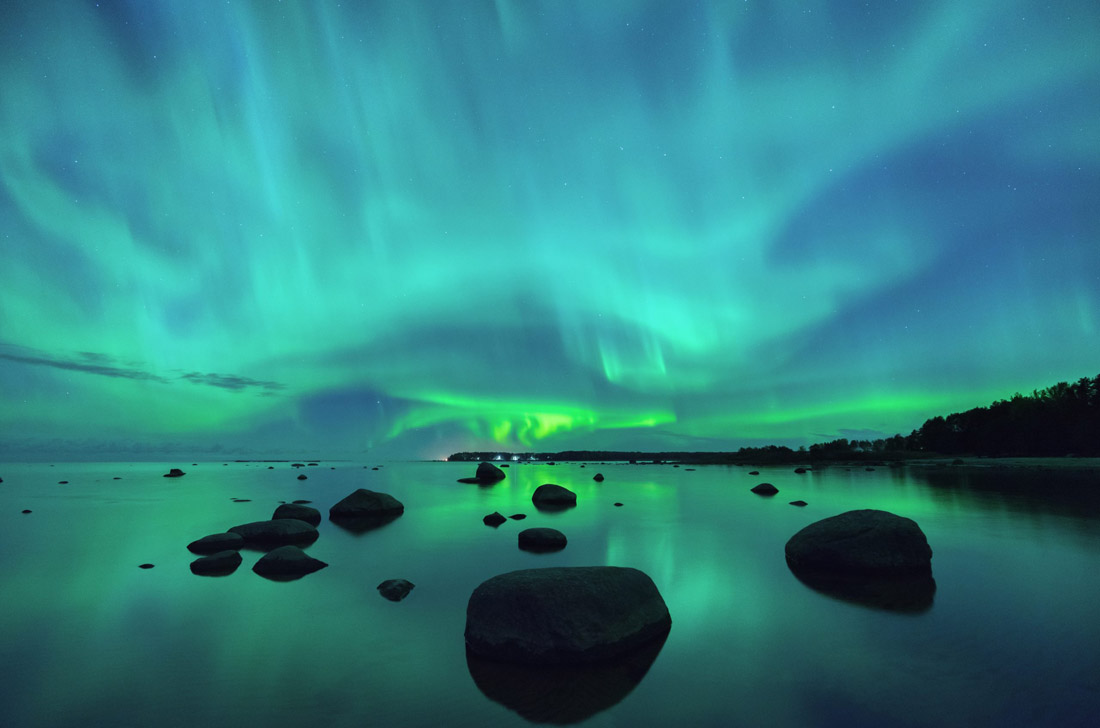 Majestic Aurora Borealis casting its glow over the Gulf of Finland