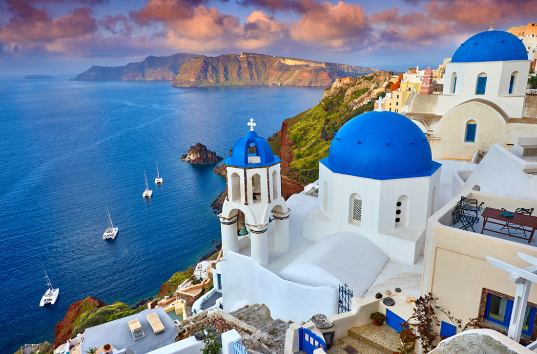 Santorini's Fira and Oia: Romantic sunrise, charming villages, and breathtaking sunsets on the island of lovers.
