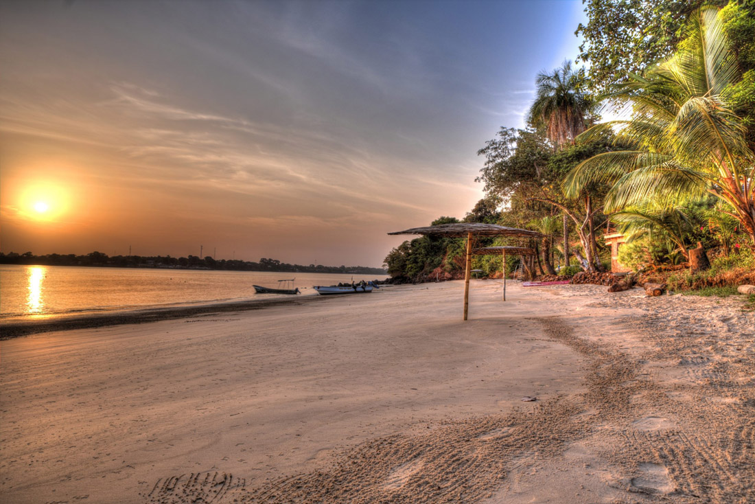 Spectacular sunset on a paradise beach in Bijagos Island, Guinea-Bissau, West Africa.