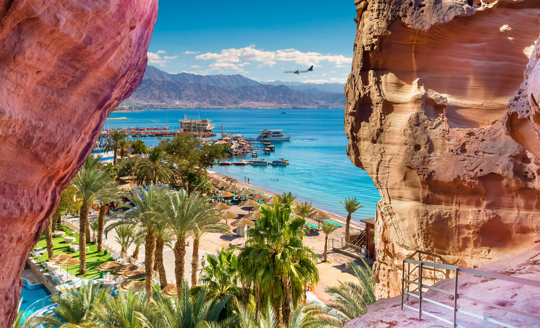 Eilat's central beach and marina, a popular tropical resort in Israel.