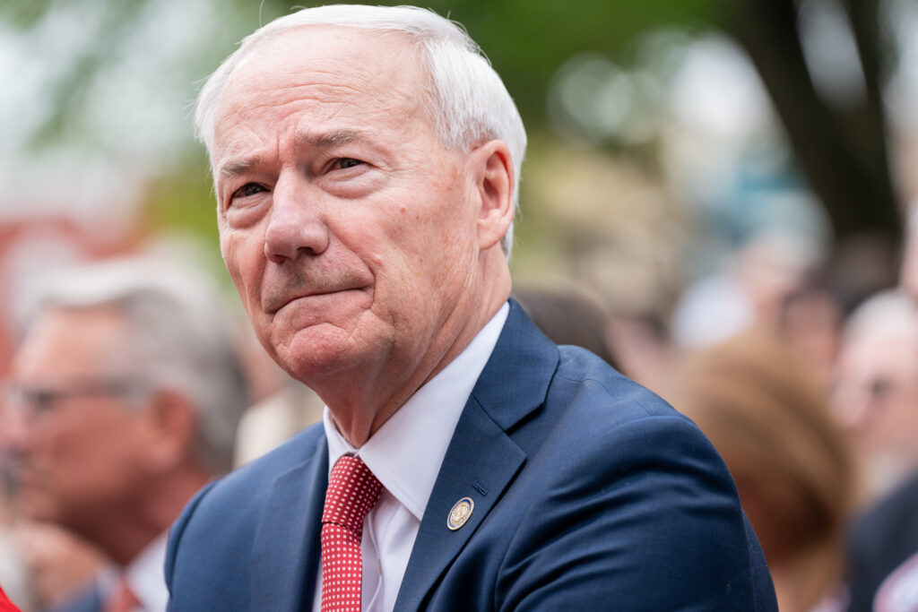 Asa Hutchinson, former Governor of Arkansas, announces he is running for President on Wednesday, April 26, 2023, from the downtown square of Bentonville, Arkansas. Mr. Hutchinson is launching his bid for president for the 2024 election from the city where he was born, practiced law and first ran for office. Photo by Shealah Craighead Photography